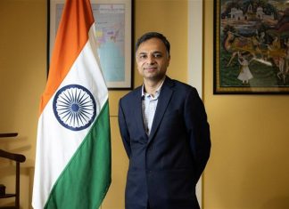 INTERVIEW/New envoy eyes closer India-Taiwan ties based on complementary strengths India's representative to Taiwan Manharsinh Laxmanbhai Yadav poses for a picture alongside the Indian national flag in Taipei on October 2