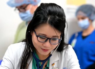 PROUD TO BE AN AMERICAN! ASIATREND FEATURES INSPIRING ASIAN-AMERICANS IN CENTRAL FLORIDA Bridging Worlds - Dr. Puxiao Cen, MD, FACC
