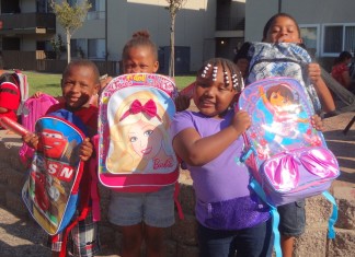 Commissioner Thompson Hosting Backpack Giveaway Event Backpack Giveaway