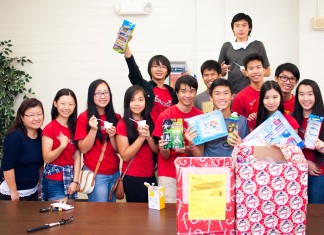 REACH of Central Florida puts “Giving” into action Collecting Toys at the Chinese Schhol of CAACF