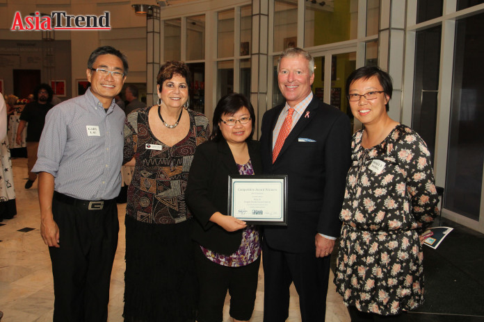 Mayor Buddy Dyer with the organizers of the Dragon Parade Lunar New Year Festival