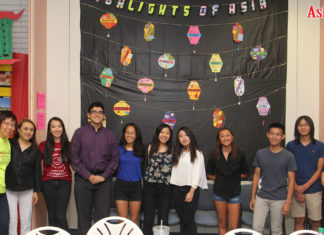REACH of Central Florida decorated 8 walls at Asia Trend Community Learning Center to build unity REACH Wall