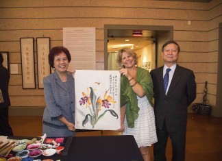 The Development of Chinese Character Scripts Ms Panxiong Hua presented a painting to Christine Rupp-Coral Gables Museum curator